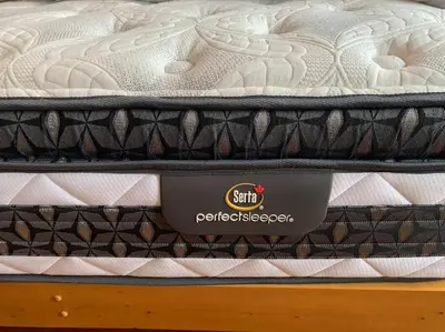 a mattress sitting on top of a bed at Appartment with Hot Tub and Backyard and Free Parking in Saint-Hyacinthe