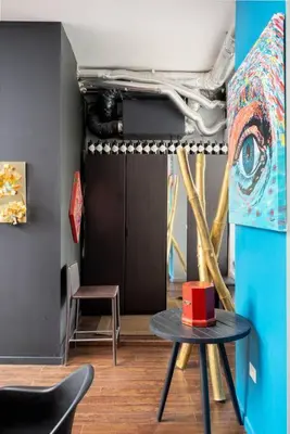 a room with a table with a red cake on it at Two bedroom duplex in Plateau Mont-Royal district in Montréal