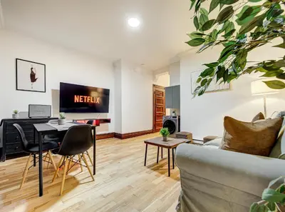 a living room with a couch and a table at Great 3B unit on Saint-Urbain in Montréal