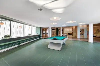 a billiard room with a pool table in it at Appartements Dorchester in Montréal