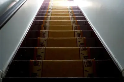 an escalator filled with boxes in a room at updated and cozy 2 bedroom unit, fully furnished, downtown, 32 days minimum in Montréal