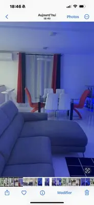 a picture of a meeting room with chairs and a couch at Marlene in Montréal