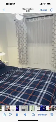 a picture of a bedroom with a blue and red mattress at Marlene in Montréal