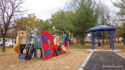 a playground in a park with a small playground at Huge 3 Bedroom Condo with a Large Patio in Montréal