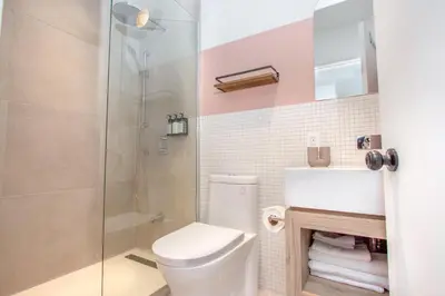 a bathroom with a toilet and a shower at Studio #7 - Self Check-In - Plateau - St-Denis in Montréal