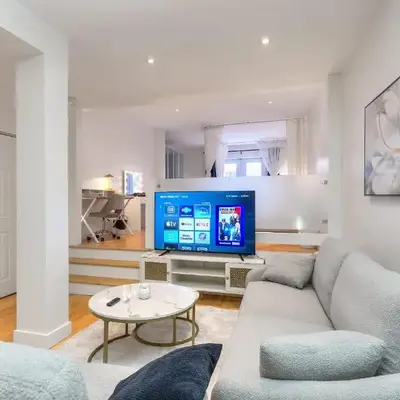 Take a break in a modern loft on the plateau Walk score 99