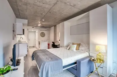a bedroom with a large bed in a room at Welcome Chez Milou in Montréal