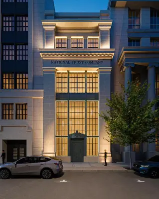 a building with a car parked in front of it at SonoLux in Montréal