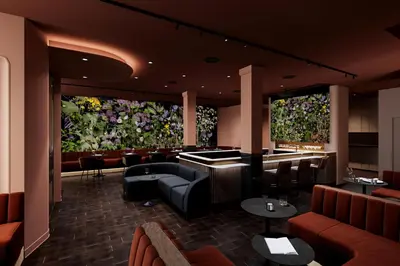 a restaurant with a bar with flowers on the walls at SonoLux in Montréal