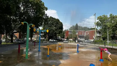 a childrens play park in the rain with a playground at Chez Walid in Montréal