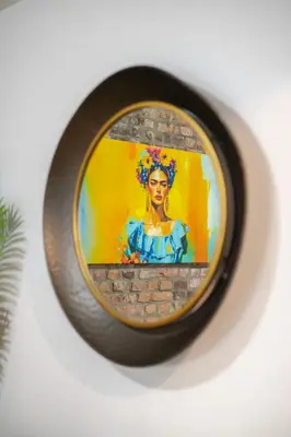 a painting of a woman on a brick wall at Elegant 4 Bedroom residence in downtown MTL in Montréal