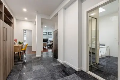 an open hallway with a dining room and a living room at Central 1BDR Apartment on Bishop Central MTL in Montréal
