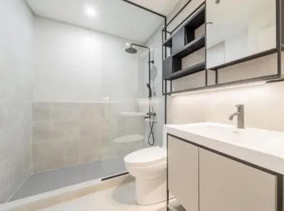 a bathroom with a toilet and a sink and a shower at Relaxing 2 bedrooms Spa in Montréal