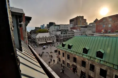 a view of a city with a green roof at Spacious two stories condo in old port free parking in Montréal
