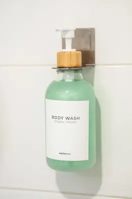 a bottle of body wash sitting on a shelf at Terracotta 1-BD in Downtown MTL in Montréal