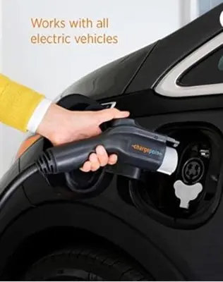 a person holding a remote control on a car at Three bedroom apartment Free parking EV charger in Longueuil