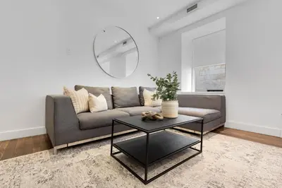 a living room with a couch and a table at The SFX Old Port in Montréal