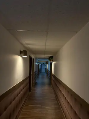 an empty hallway in an office building at Motel Le Villageois Du Lac in Saint-Francois-du-Lac