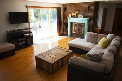 a living room with a couch and a coffee table at Piece of heaven near Montreal in Saint-Marc-sur-Richelieu