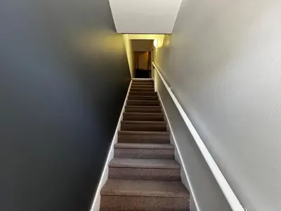 a stairway with a stair case in a building at Homa 1 in Montréal