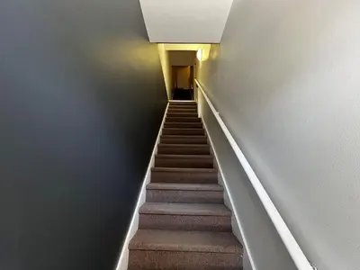 a stairway with a stair case in a building at Homa 1 in Montréal