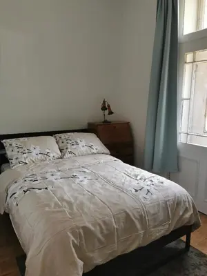 a bedroom with a bed and a window at Grand Appartement centre-ville 1227, 3 chambres in Montréal