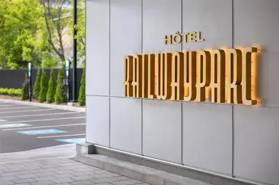 a hotel sign on the side of a building at Hotel Railwayparc Montreal, Tapestry Collection By Hilton in Montréal
