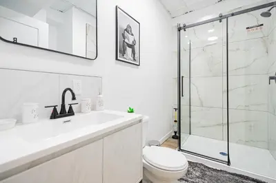 a bathroom with a shower and a toilet and a sink at Room n1-Apartment 1 in a SHARED apartment in downtown Montreal in Montréal