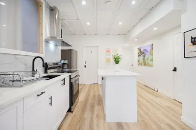 a kitchen with white cabinets and a white counter top at Room n2-Apartment 1 in a SHARED apartment in downtown Montreal in Montréal