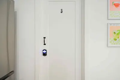 a white door with a lock on it at Room n3-Apartment 1 in a SHARED apartment in downtown Montreal in Montréal