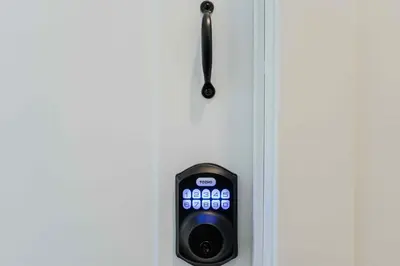 a remote control is hanging on a door at Room n6-Apartment 1 in a SHARED apartment in downtown Montreal in Montréal