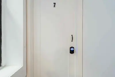 a white door with a lock on it at Room n7-Apartment 1 in a SHARED apartment in downtown Montreal in Montréal