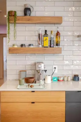 a kitchen with a counter with a coffee maker on it at Bel appartement confortable - Emplacement idéal in Montréal