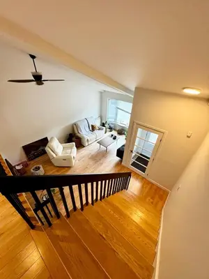 a view of a living room with a couch at Fully furnished cozy home in Montréal