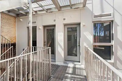 a front entrance of a house with a glass door at Habitat in Montréal