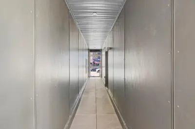 a hallway of a building with a long corridor at Habitat in Montréal