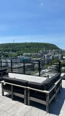 a group of benches sitting on top of a building at Great view 1BDRM APTR in heart of Montreal DWTN in Montréal