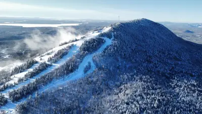 an aerial view of a snow covered mountain at Ski Condo & Spa - L'Elegance Des Sommets in Adstock