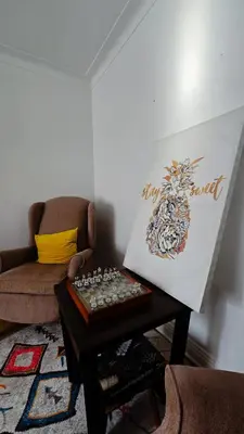 a living room with a couch and a coffee table at Private rooms in a shared three bedroom apartment in Montréal