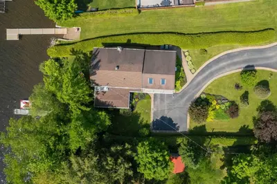 an aerial view of a house and a road at La Brise O-Lac in Sherbrooke