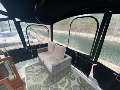 a chair sitting on the back of a boat at Chalet Boat in the heart of Montreal in Montréal