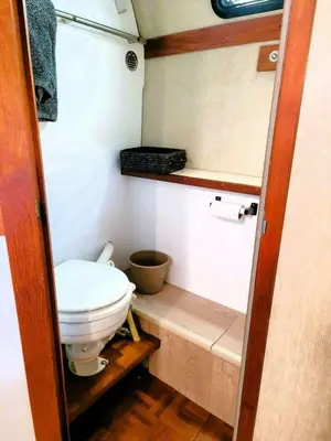 a small bathroom with a toilet in an rv at Chalet Boat in the heart of Montreal in Montréal