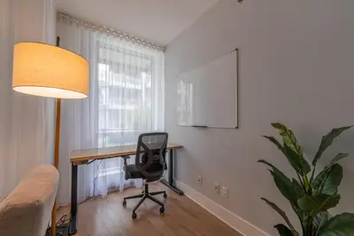 a home office with a desk and a chair at Modern Condo Old Town Montreal in Montréal