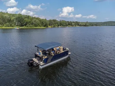 a group of people on a small boat on a lake at Private Boat Tour Montreal in Boucherville