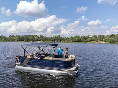 a group of people on a blue boat on a lake at Private Boat Tour Montreal in Boucherville