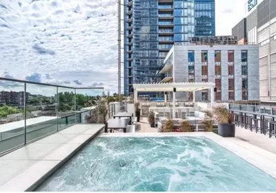 a swimming pool on the roof of a building at TDC2 - 28th floor - 2 bd, 2 bth in Montréal