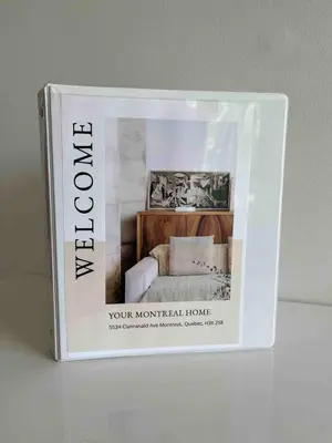 a book of your montreal home is on a table at Large Sunny 3 bedroom home in great neighbourhood in Montréal