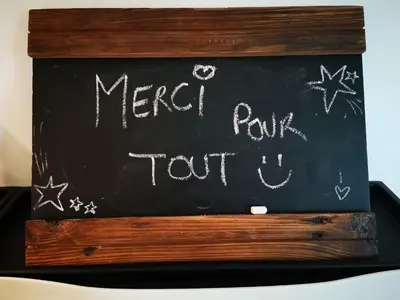 a blackboard with the words merrettroth put out at Private Hummingbird Room - Modern & Cozy in Mansonville