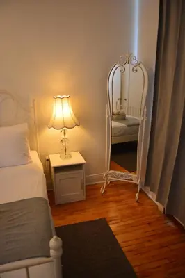 a bedroom with a bed and a mirror at Van Horne Sweet Celebration in Montréal