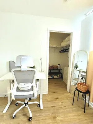 an office with a white desk and a chair at MTR Apart Montreal Hospital Corporate Stay in Longueuil
